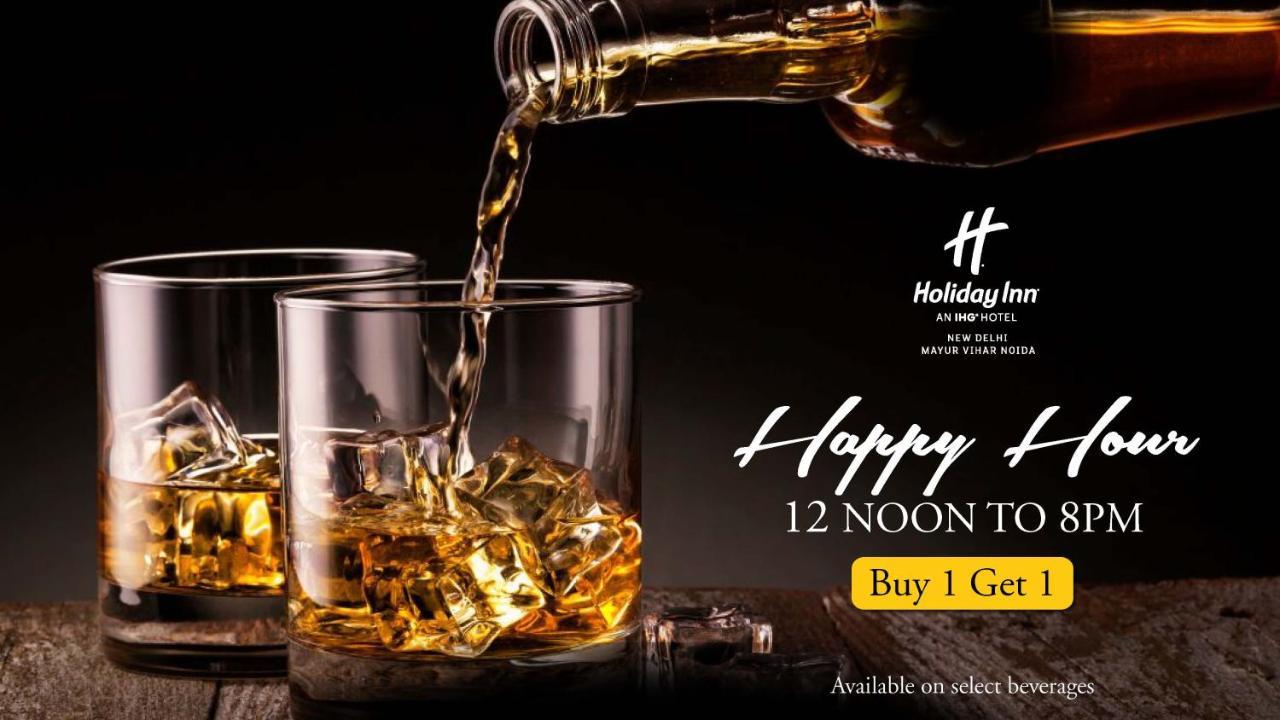 Holiday Inn New Delhi Mayur Vihar Noida By Ihg Екстер'єр фото A poster advertising a happy hour